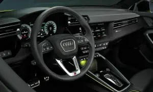 Wnętrze nowego Audi A3: cyfrowy kokpit, sportowa kierownica i nowoczesna konsola środkowa.