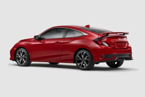 Czerwony Honda Civic Si coupe z czarnym spojlerem i felgami, gotowy do dynamicznej jazdy.