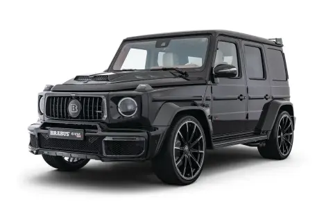 Czarny Mercedes G klasa Brabus GV12 z masywnym grillem i felgami. Sprawdź jego imponującą mercedes g klasa brabus cena.