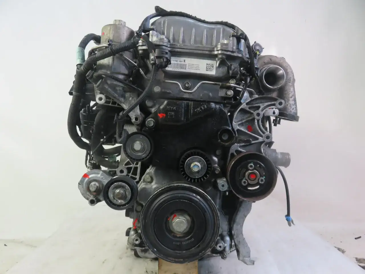 Silnik Chevrolet Orlando 2.0 diesel. To jednostka napędowa z turbosprężarką, widoczne są elementy układu paliwowego i chłodzenia.
